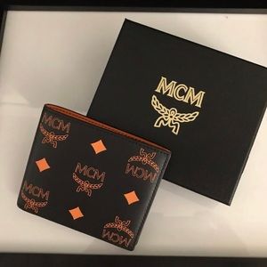 MCM men’s leather Visetos bifold wallet